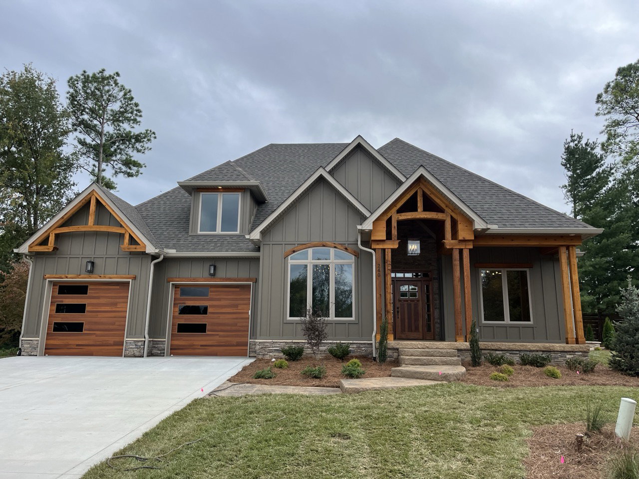 A Tony Henon Construction home with stone and cedar timber accents